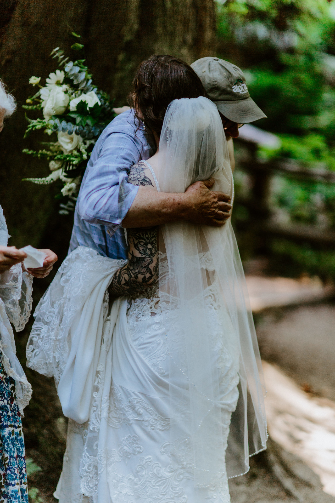 Adrielle hugs family after her elopement at Olympic National Park, Washington.