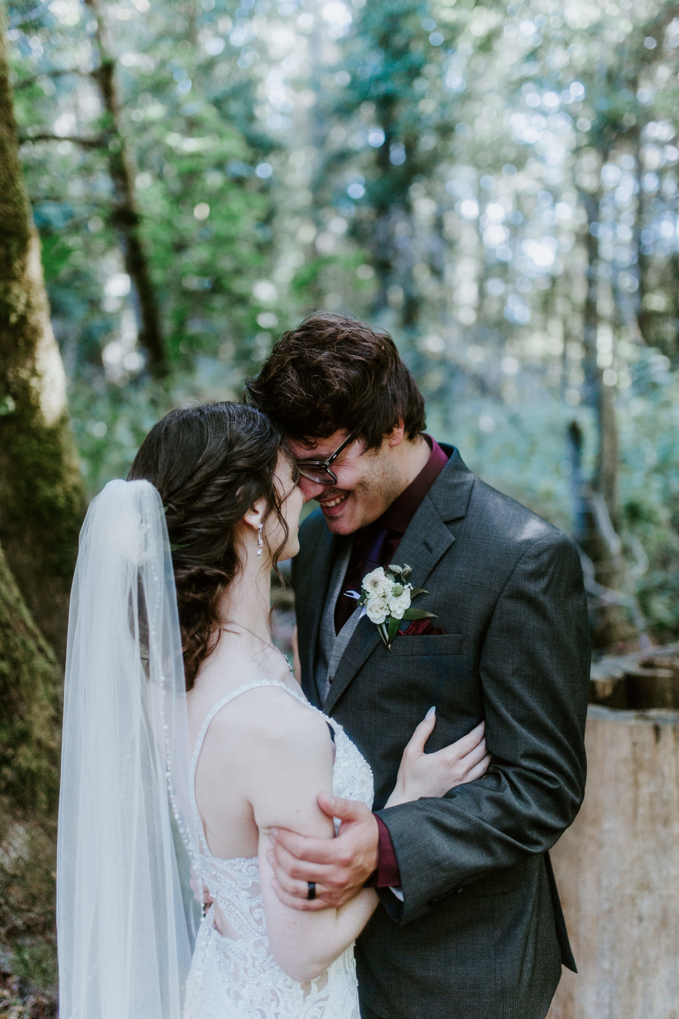 Coty and Adrielle stand forehead to forehead during their elopement at Olympic National Park, Washington.