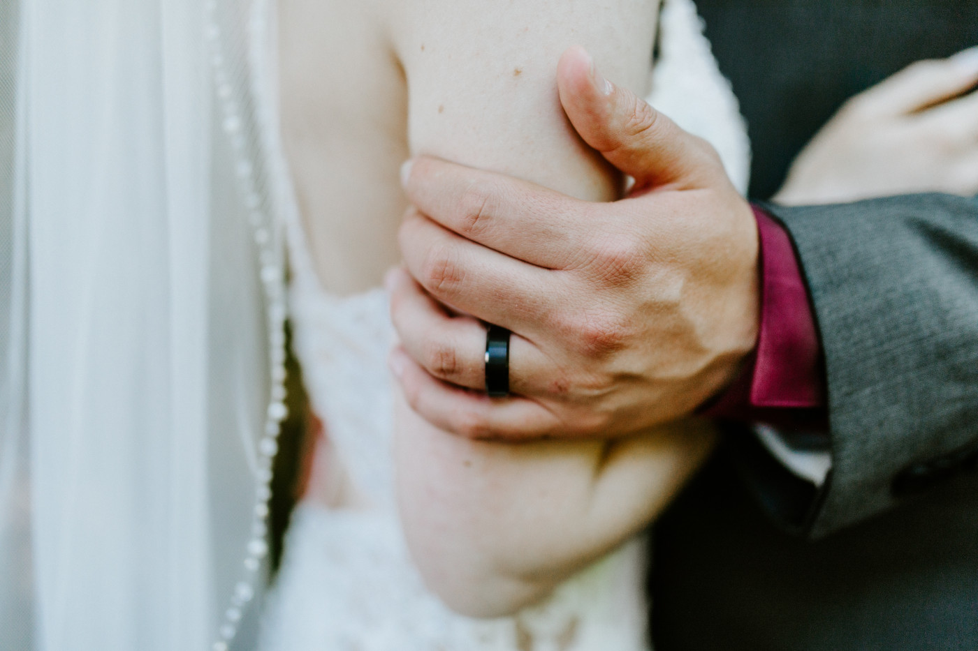 Coty holds Adrielle's arm after their elopement at Olympic National Park, Washington.