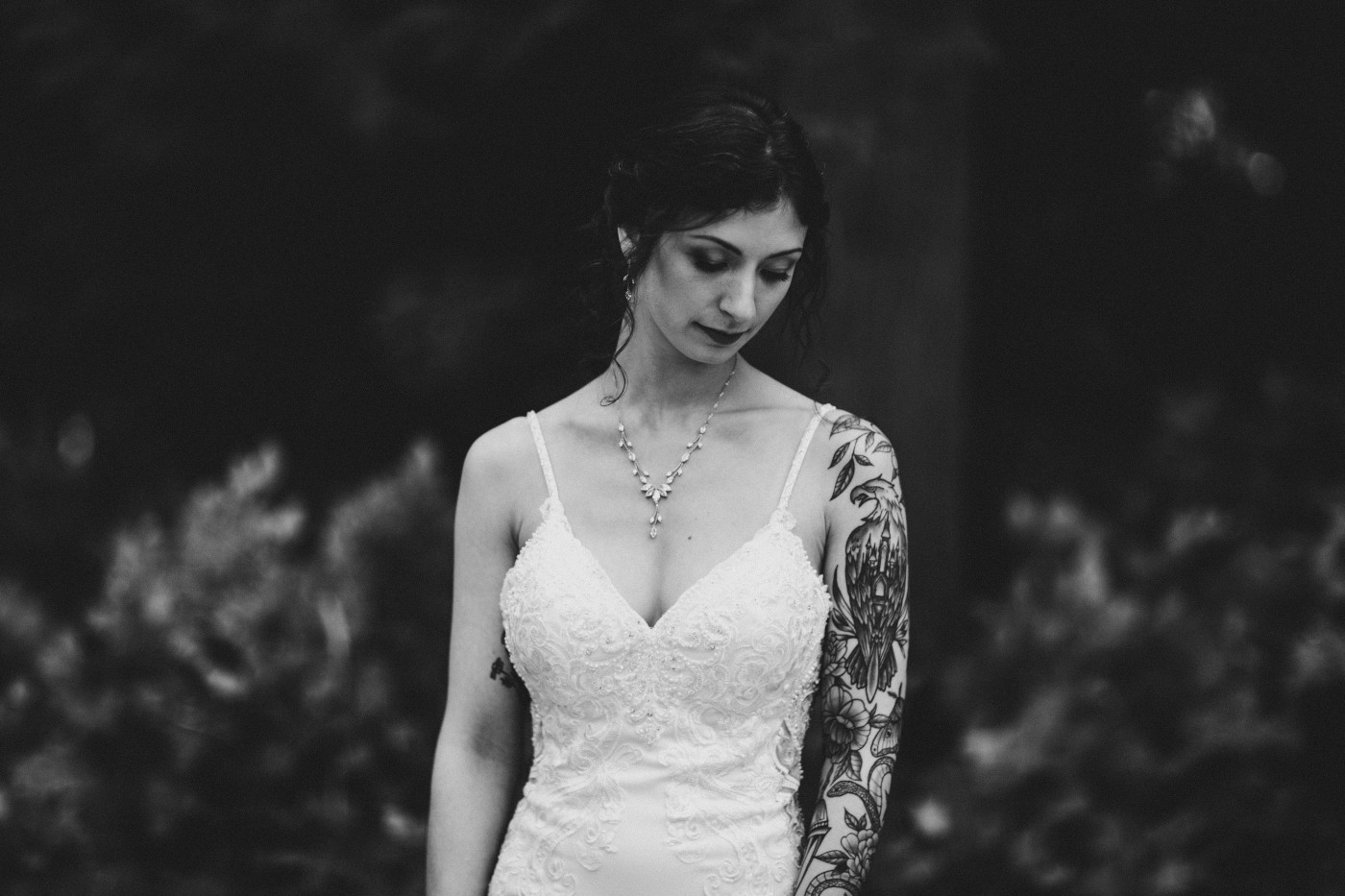 Adrielle stands alone in her bridal dress at Olympic National Park, Washington.