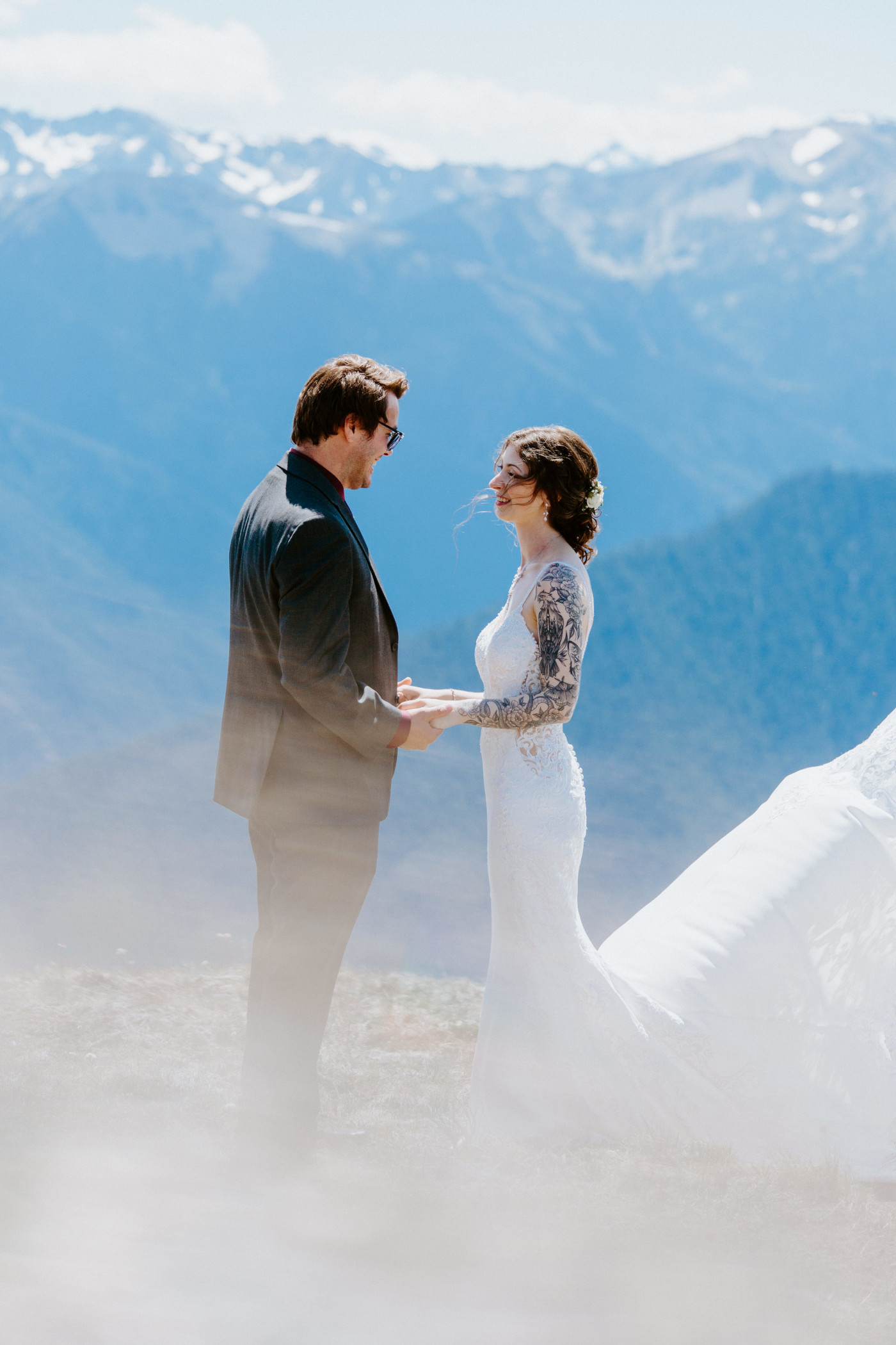 Adrielle and Coty hold hands at Olympic National Park, Washington.