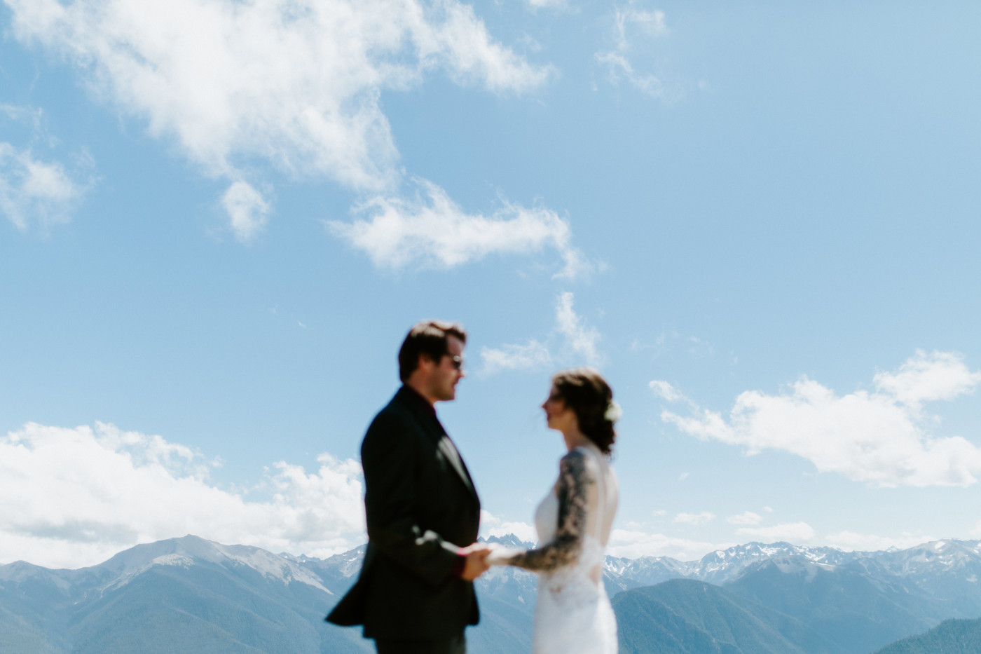 Adrielle and Coty stand together holding hands at Olympic National Park, Washington.