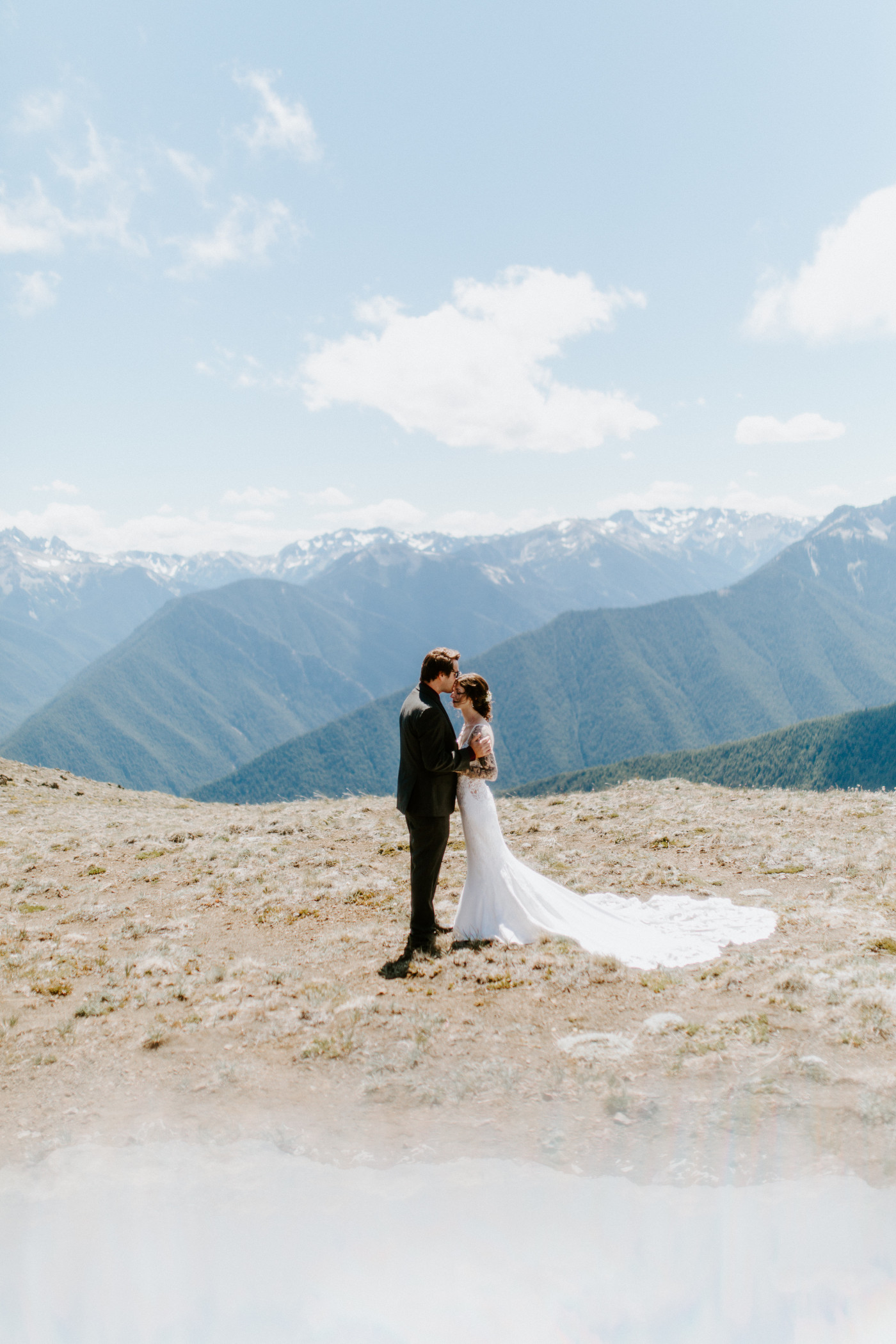 Adrielle and Coty kiss at Olympic National Park, Washington.