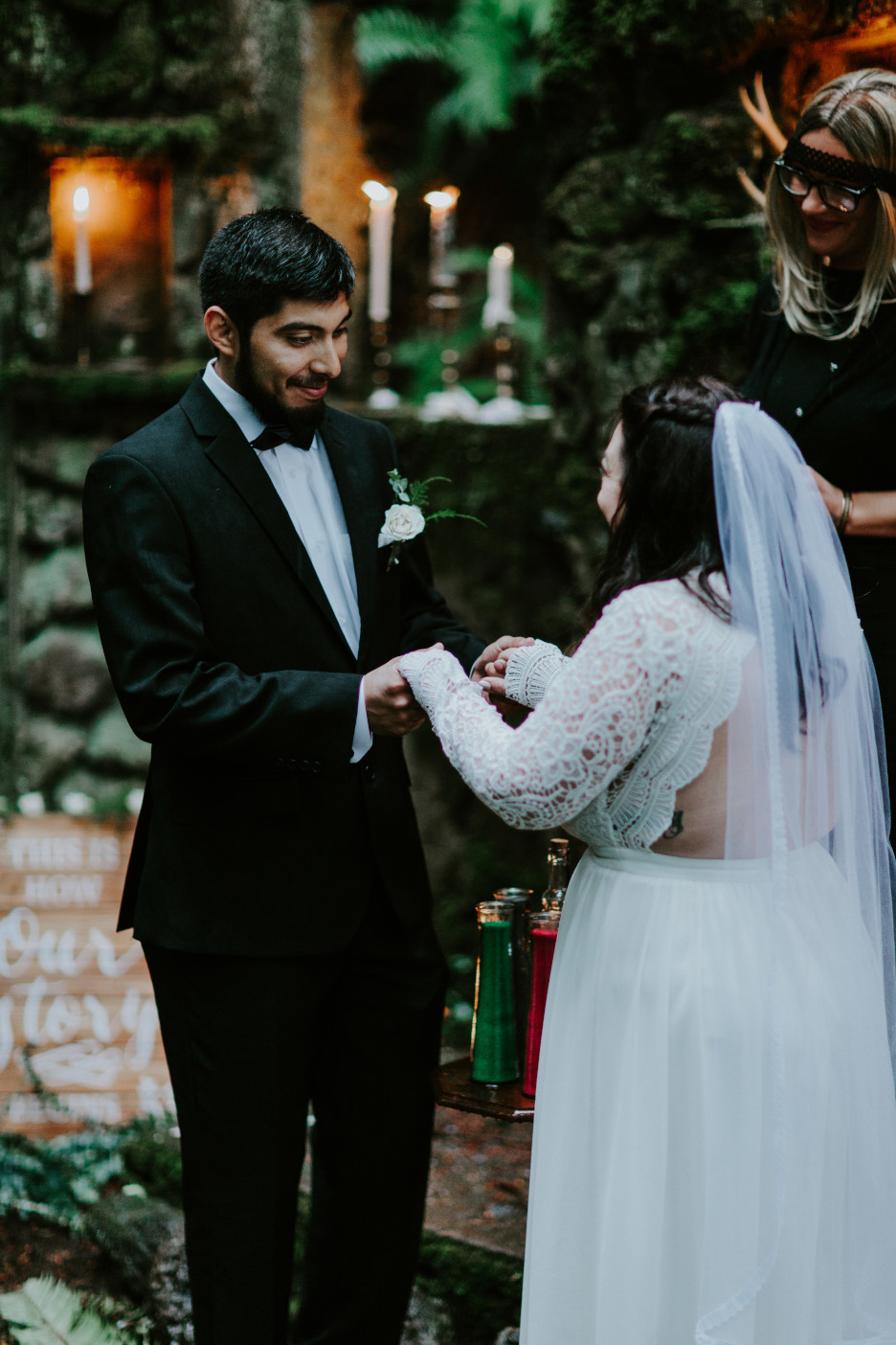 Sarah and Sam hold each others hands at Skamania House, Washington. Elopement photography in Portland Oregon by Sienna Plus Josh.