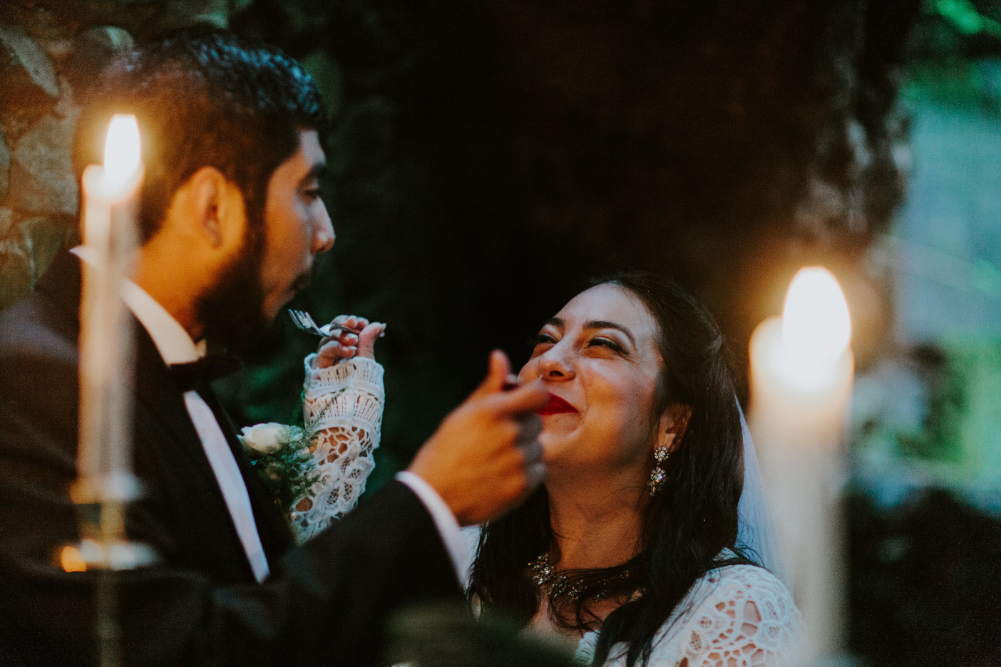 Sarah and Same feed each other cake at Skamania House, Washington. Elopement photography in Portland Oregon by Sienna Plus Josh.