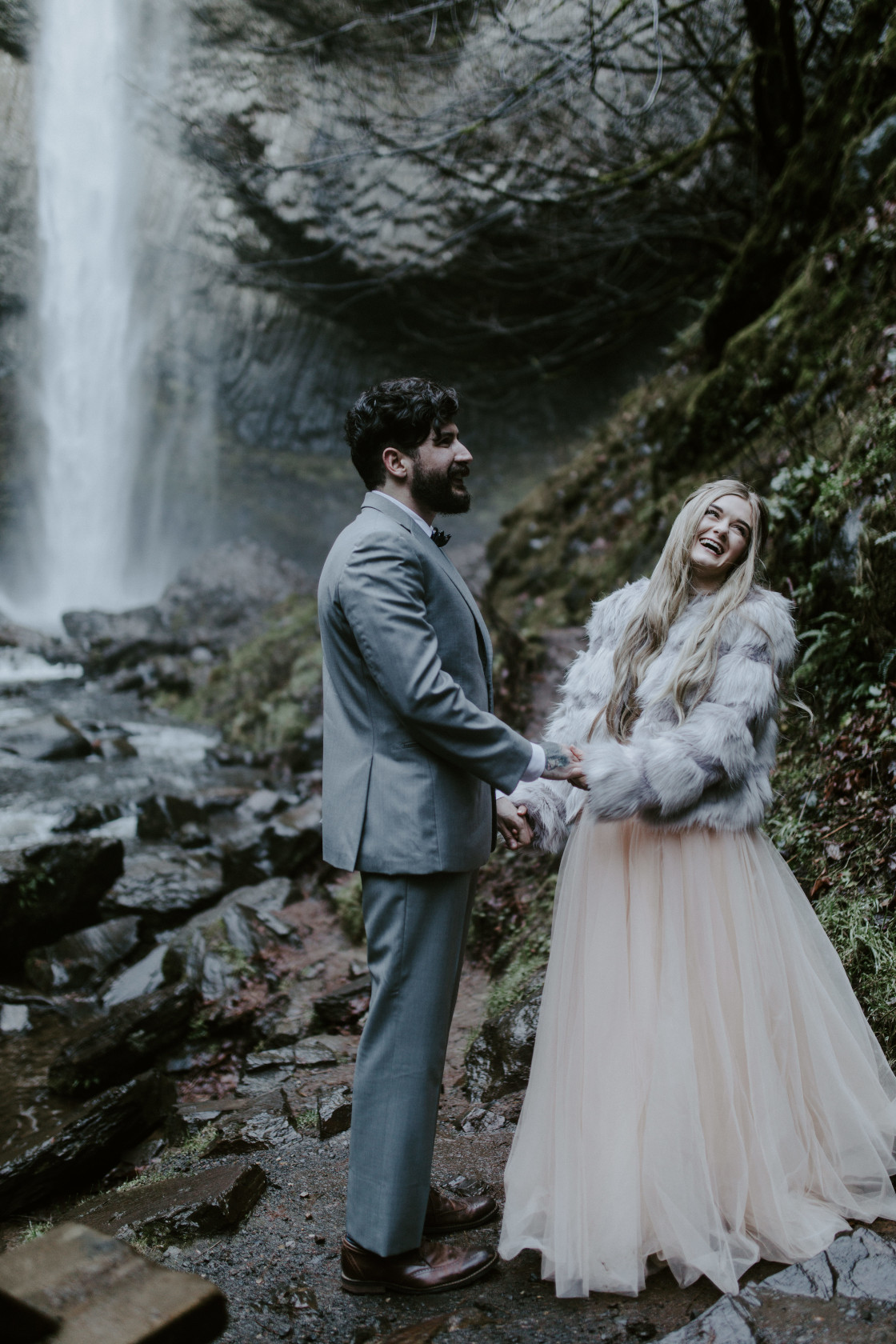 Boris and Tyanna laugh during their elopement ceremony. Adventure elopement in the Columbia River Gorge by Sienna Plus Josh.