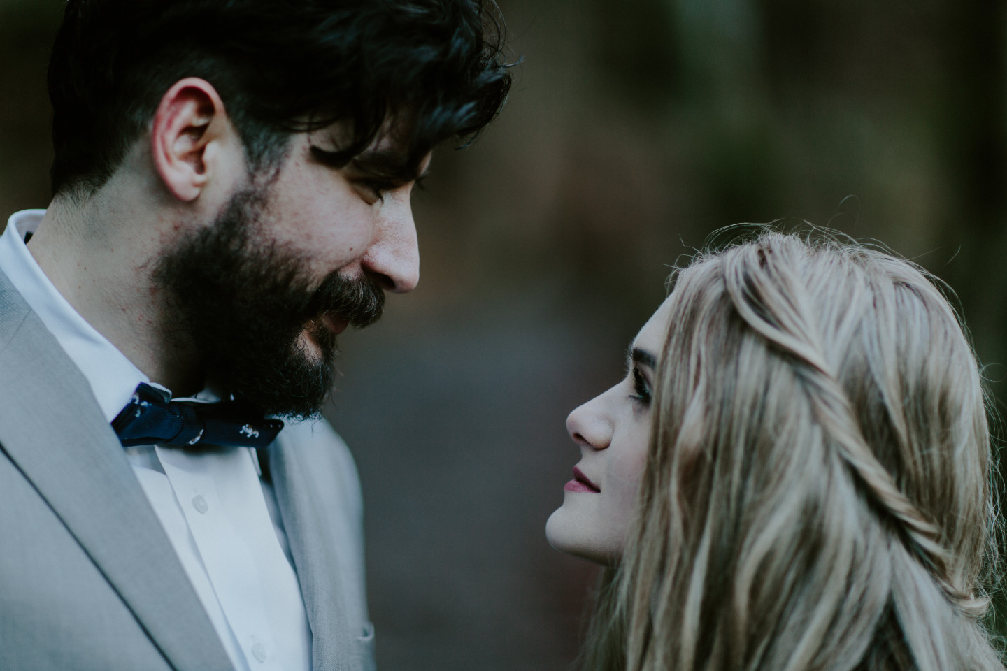 Boris and Tyanna look each other in the eyes. Adventure elopement in the Columbia River Gorge by Sienna Plus Josh.