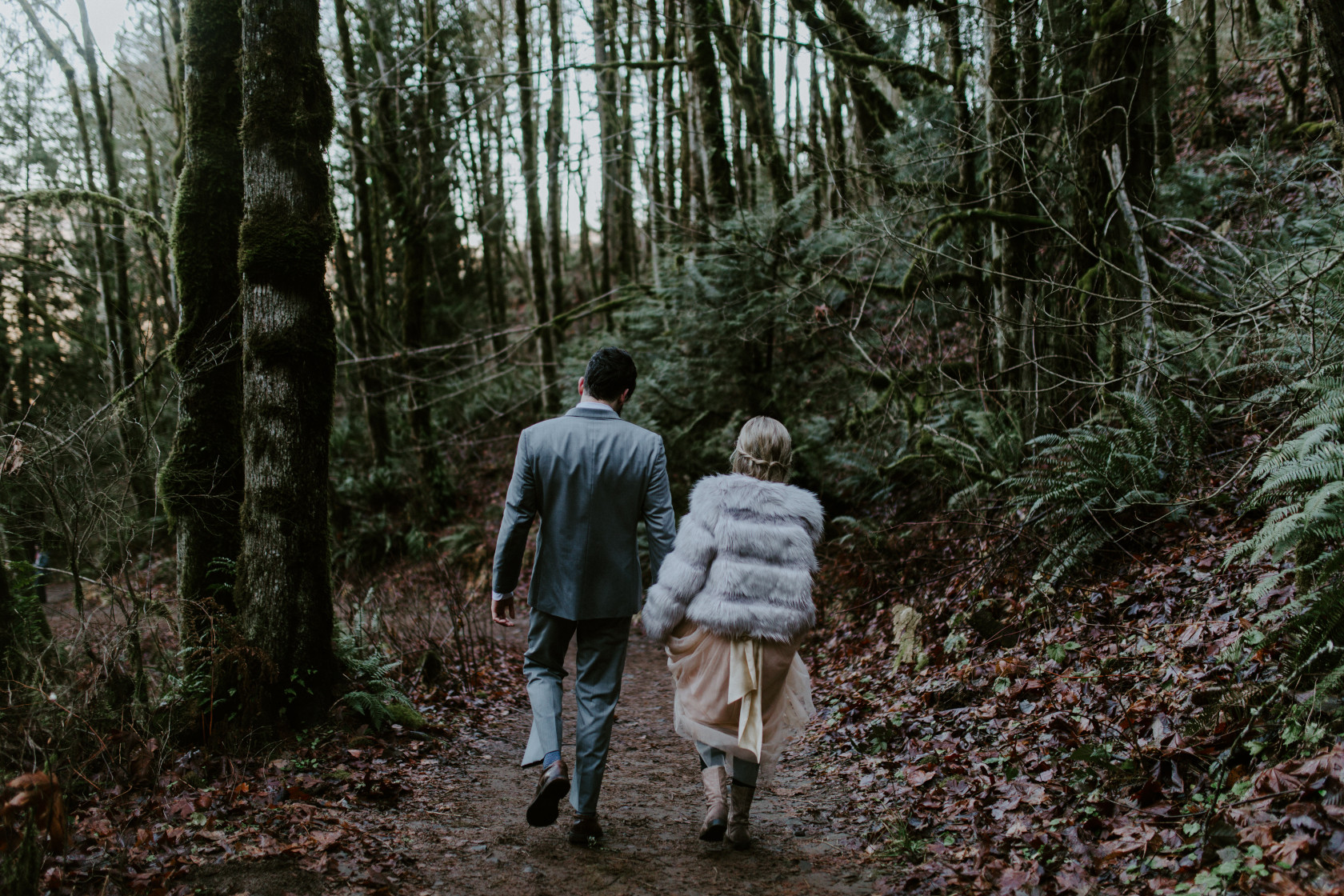 Boris and Tyanna walk down the trail. Adventure elopement in the Columbia River Gorge by Sienna Plus Josh.