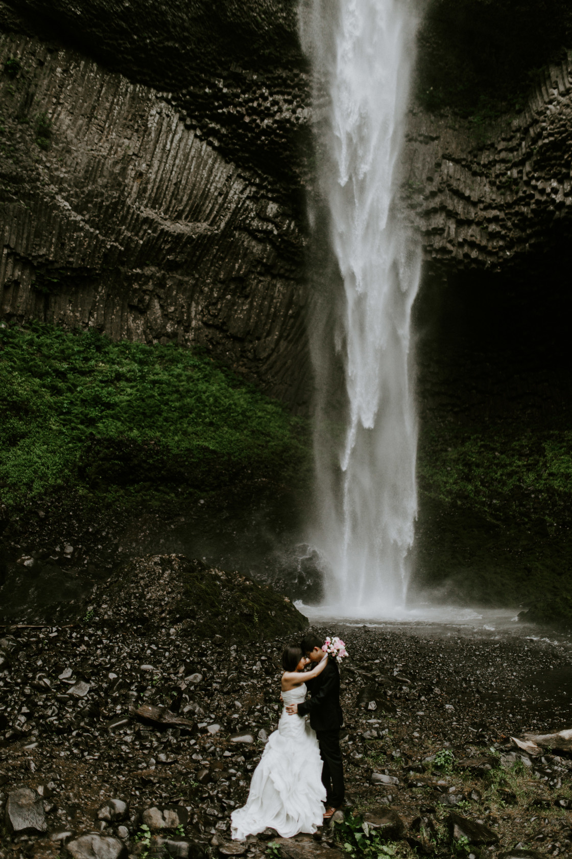 Alex and Valerie stand forehead to forehead at a waterfall. Elopement wedding photography at Mount Hood by Sienna Plus Josh.