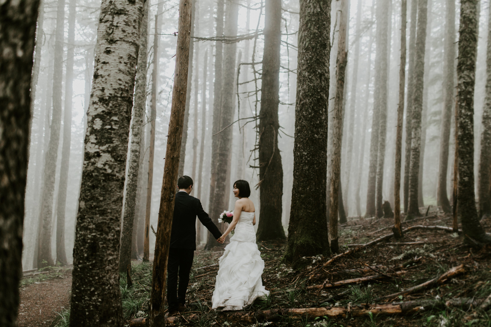 Valerie and Alex walk through the woods of Mount Hood. Elopement wedding photography at Mount Hood by Sienna Plus Josh.