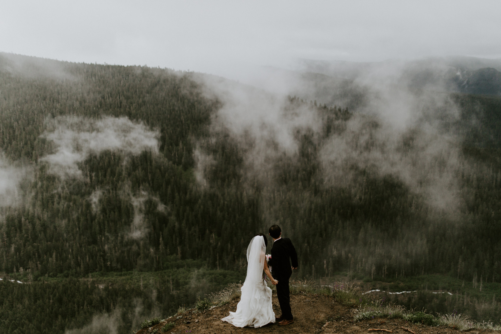 Valerie and Alex look out at the view near  Mount Hood, OR. Elopement wedding photography at Mount Hood by Sienna Plus Josh.
