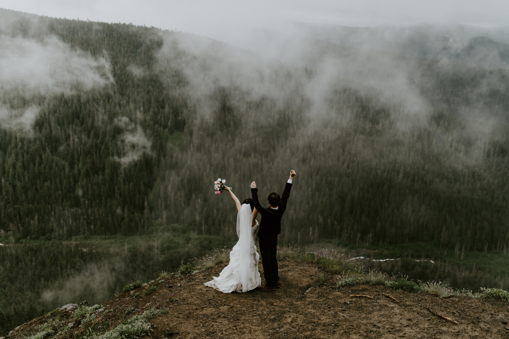 Valerie and Alex share a moment of victory at Mount Hood, OR. Elopement wedding photography at Mount Hood by Sienna Plus Josh.
