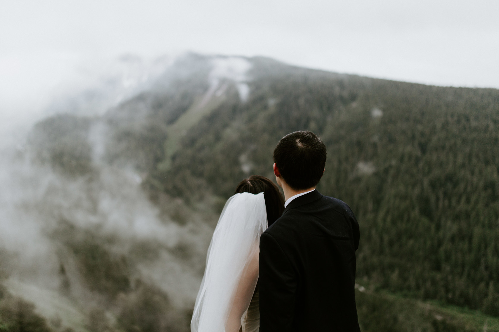 Alex and Valerie stand before the fog at Mount Hood, OR. Elopement wedding photography at Mount Hood by Sienna Plus Josh.