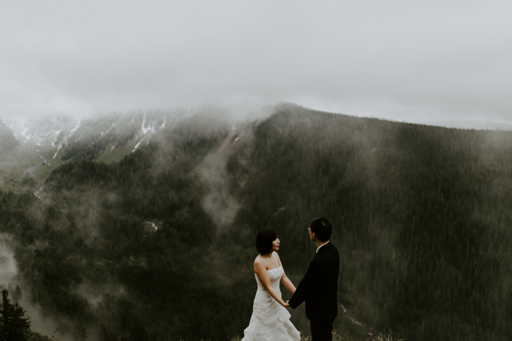Alex and Valerie hold hands. Elopement wedding photography at Mount Hood by Sienna Plus Josh.