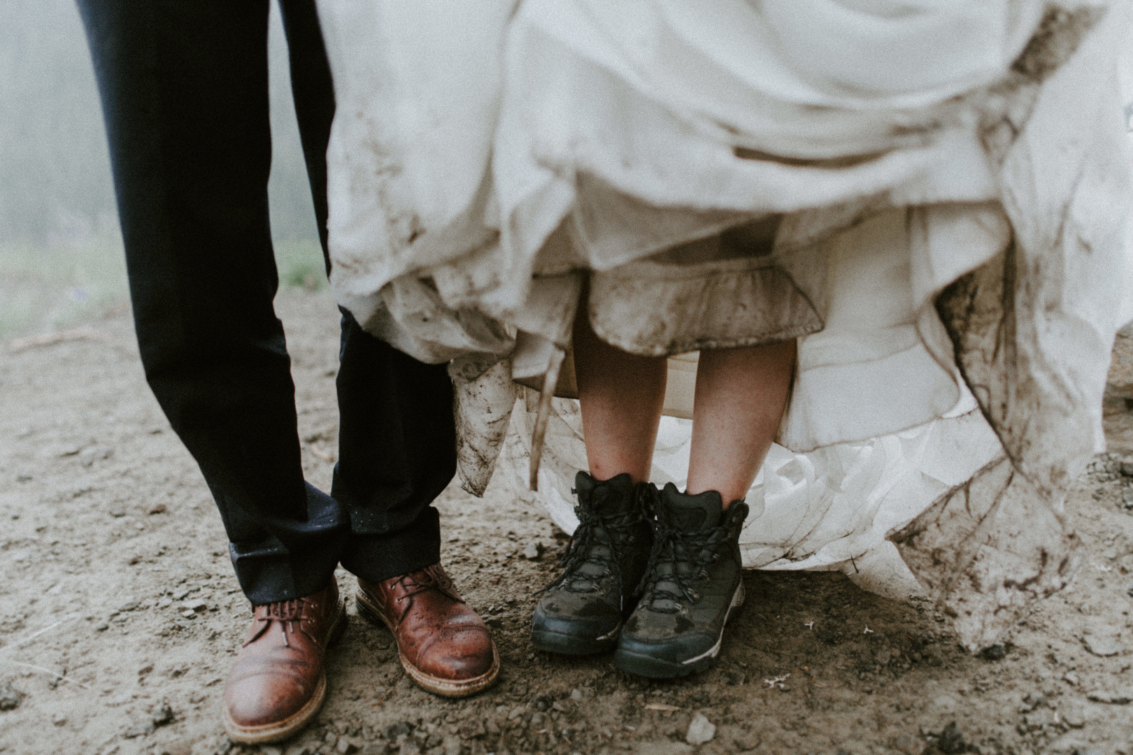 Valerie and Alex show off their muddy boots and shoes. Elopement wedding photography at Mount Hood by Sienna Plus Josh.