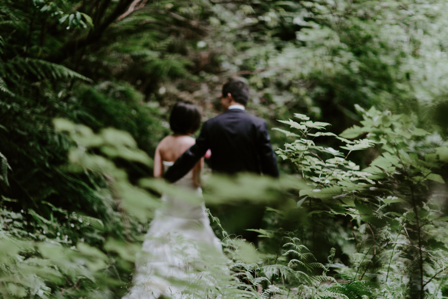 Alex and Valerie walk along a trail. Elopement wedding photography at Mount Hood by Sienna Plus Josh.