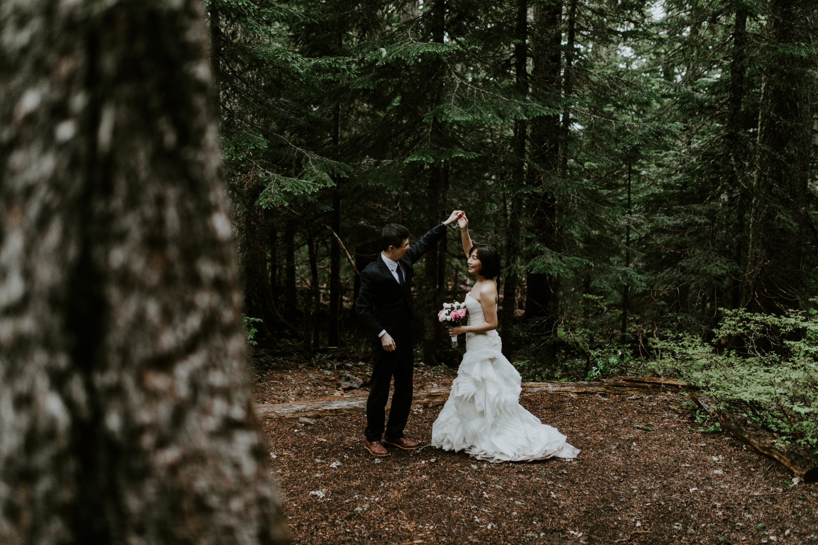 Alex and Valerie dance in the middle of the woods near Mount Hood. Elopement wedding photography at Mount Hood by Sienna Plus Josh.