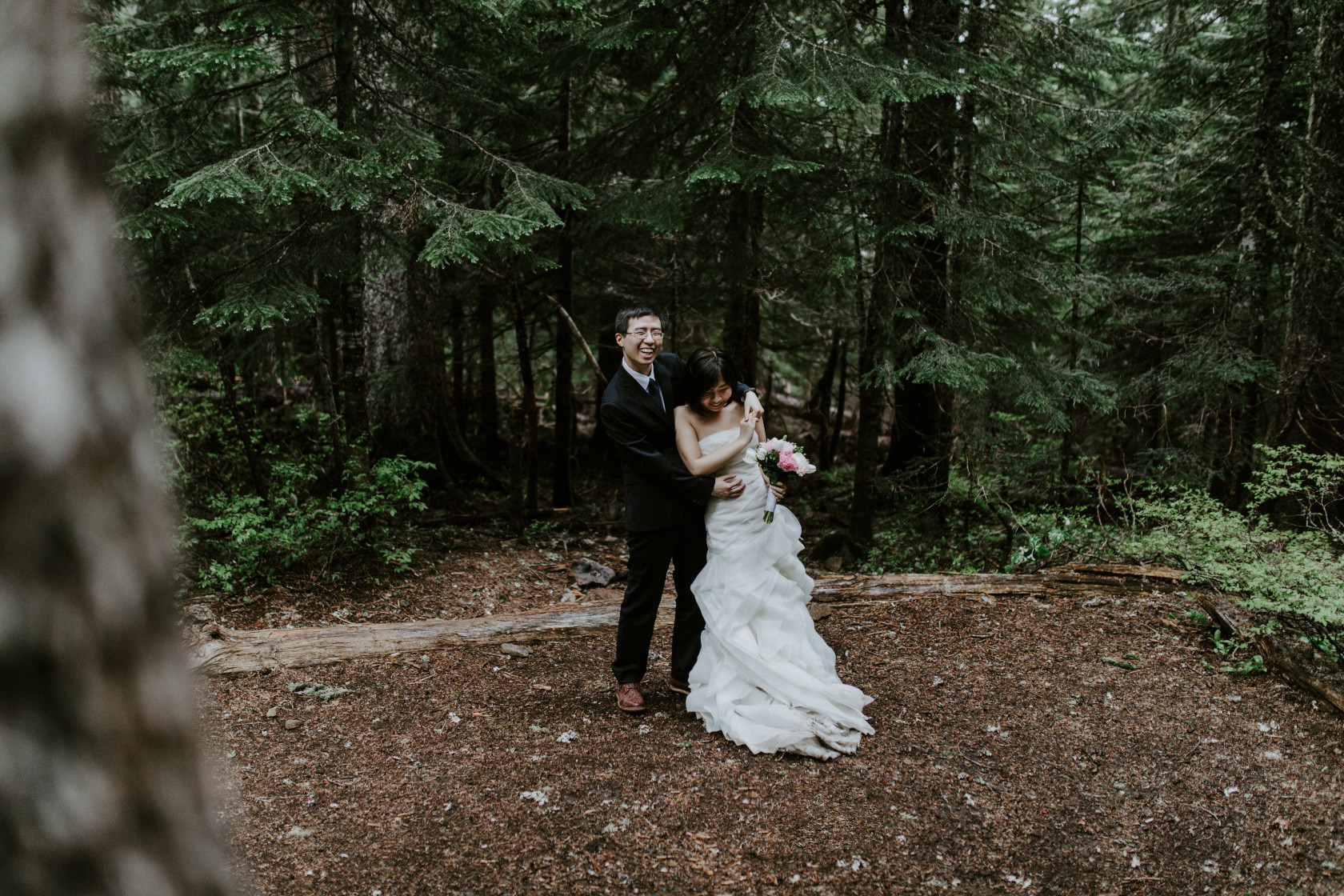 Alex holds Valerie along the trail. Elopement wedding photography at Mount Hood by Sienna Plus Josh.