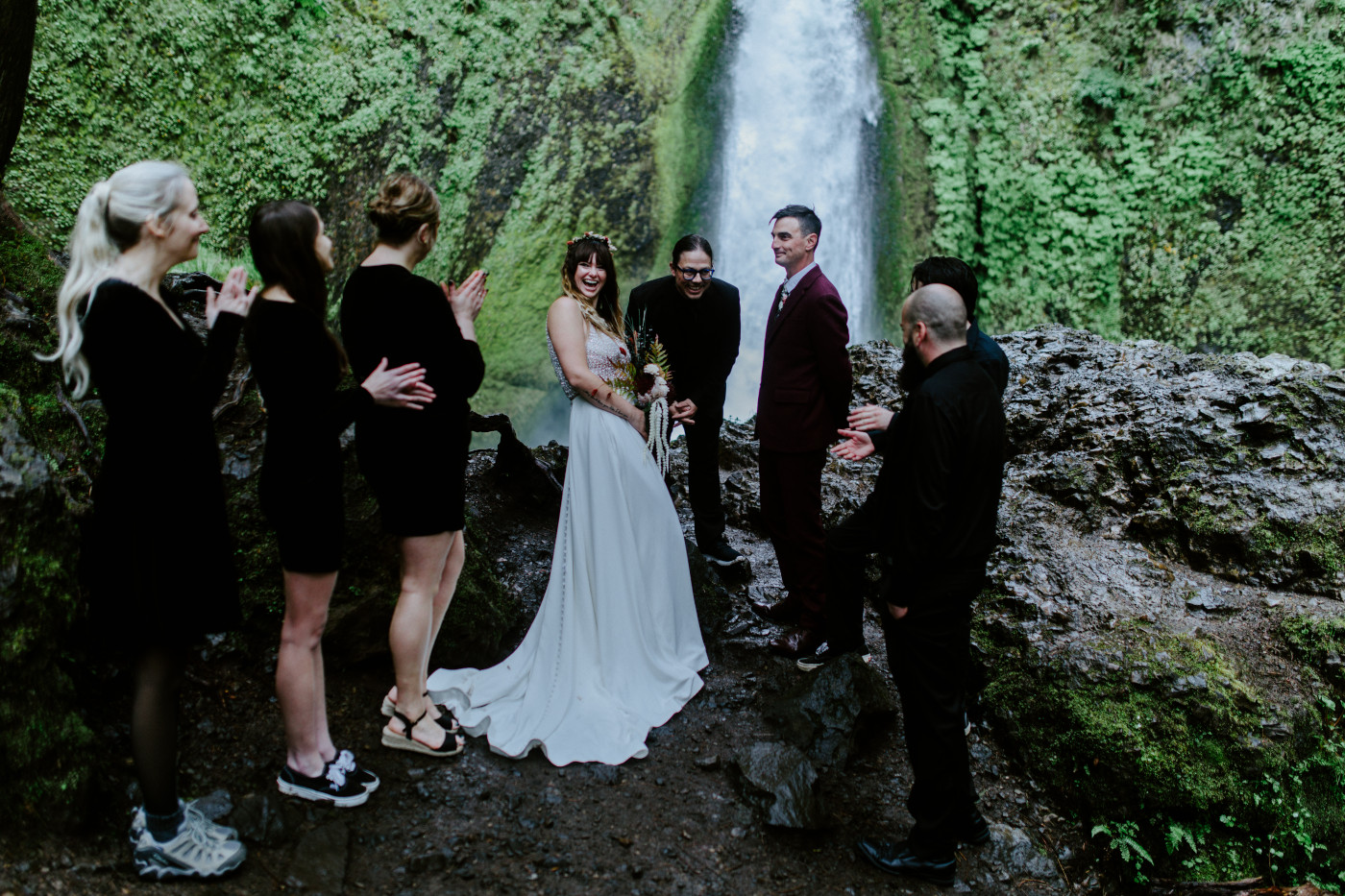 Jordan and Andrew begin their elopement ceremony in front of Wahclella Falls.